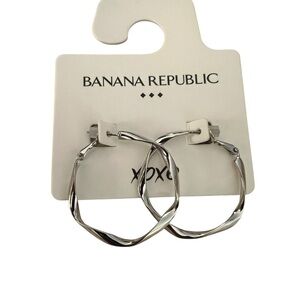 NEW, Banana Republic twisted hoop
Earrings. Silver tone